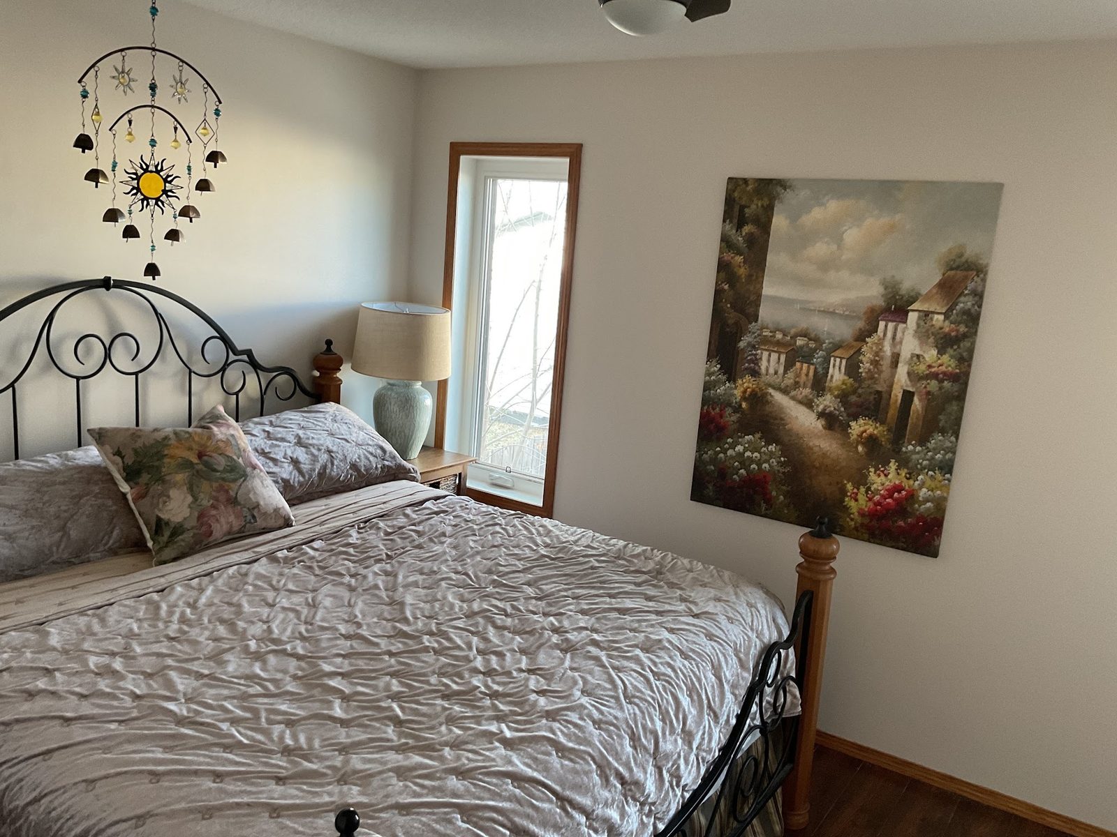 Bedroom repainted in a soft neutral tone in Red Deer