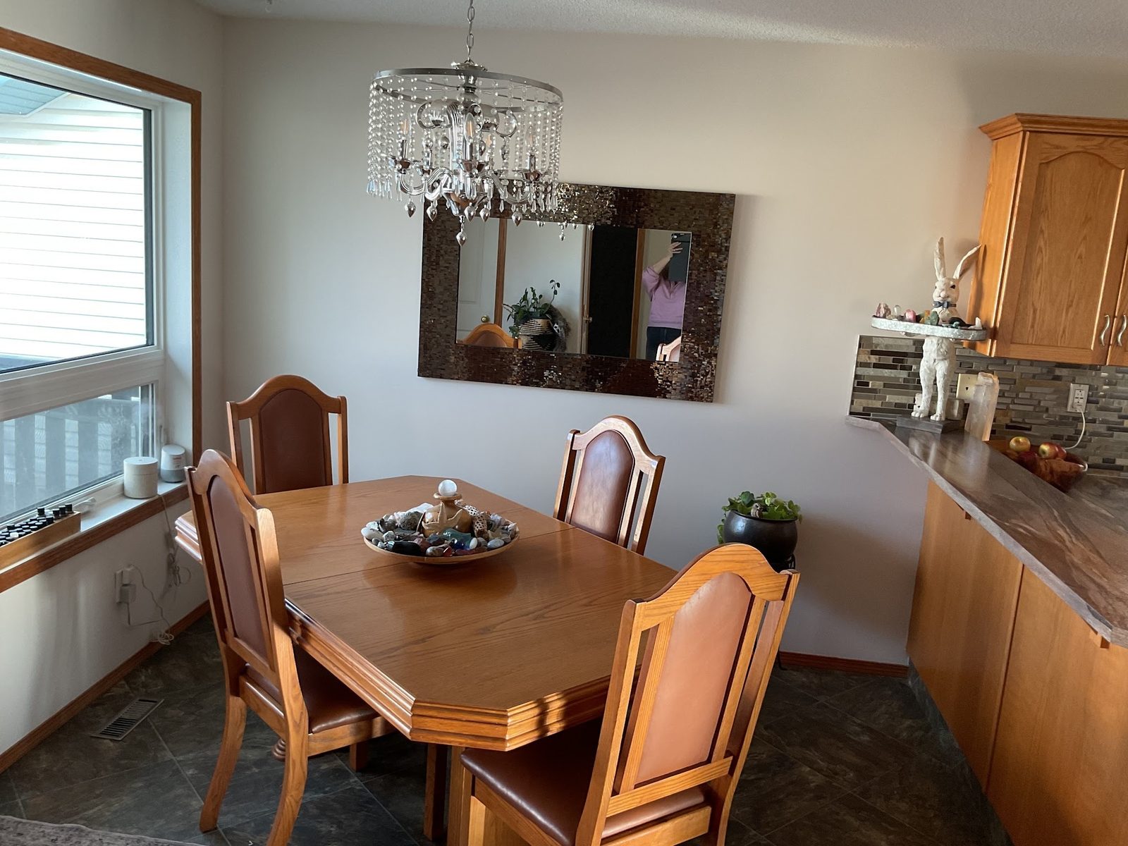Dining room walls repainted in a warm neutral in Red Deer