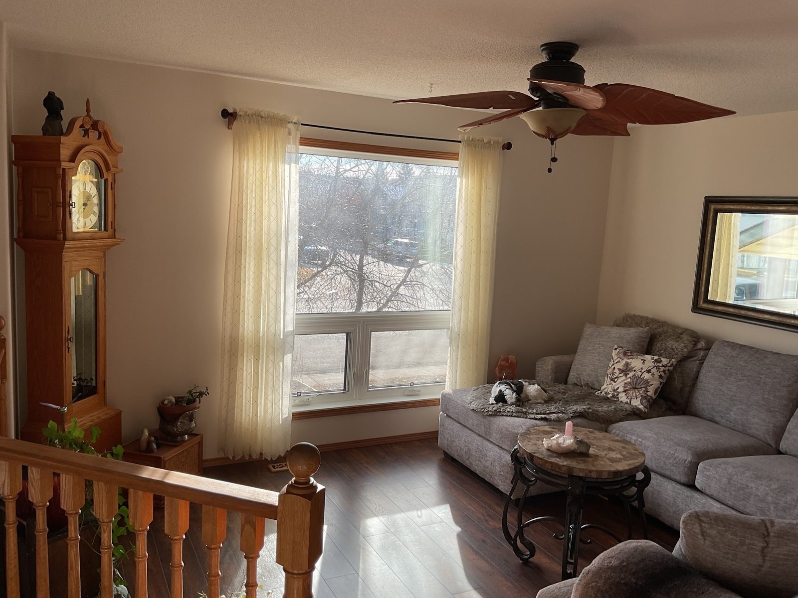Freshly painted living room with a large front window in Red Deer
