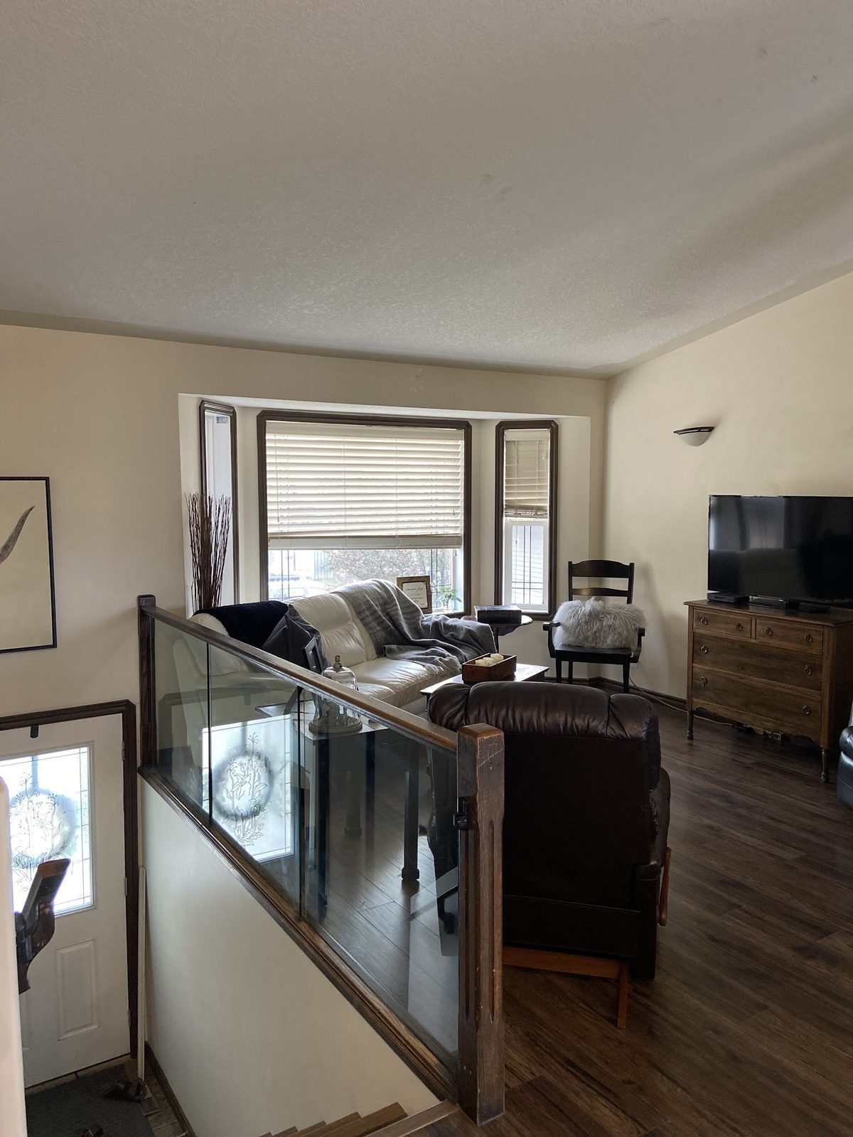 Living room repainted in a neutral shade in a Red Deer home